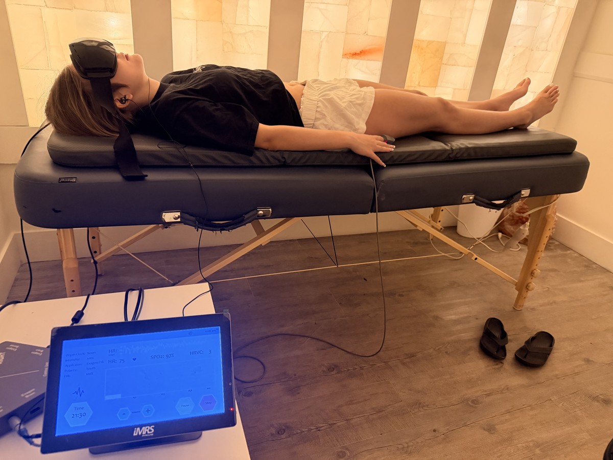 Clinical detail — hands on the device, protocol screen, or patient placement